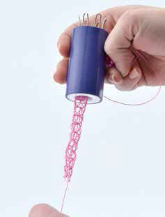 Wire knitter with a length of knit wire 